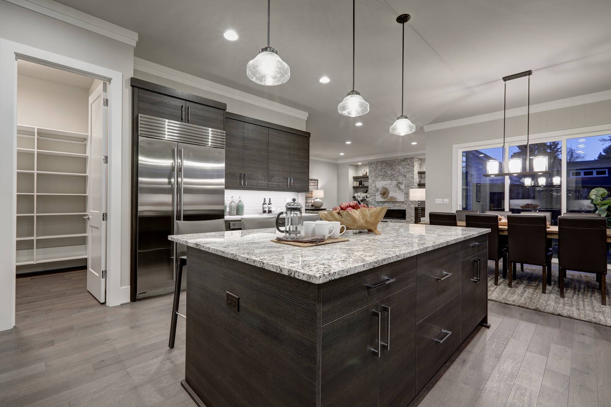 modern gray kitchen features dark gray cabinetry